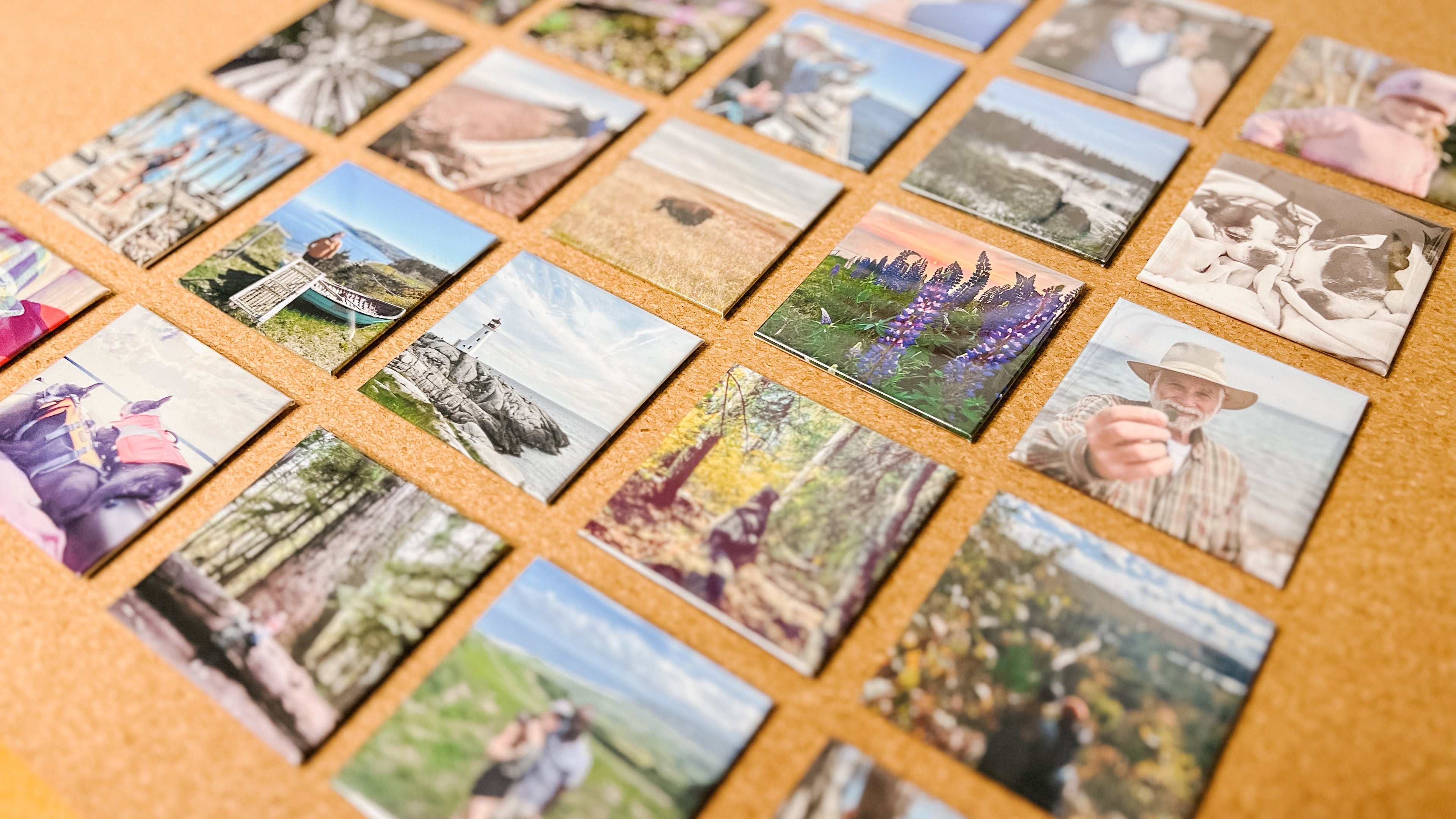 Several custom photo magnets on a flat surface 